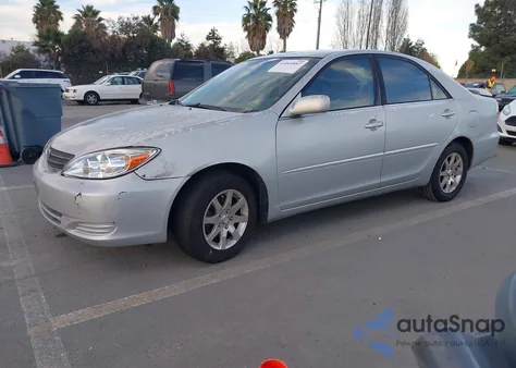 2003 Toyota Camry Le from USA, damaged, VIN 4T1BE32K43U170137
